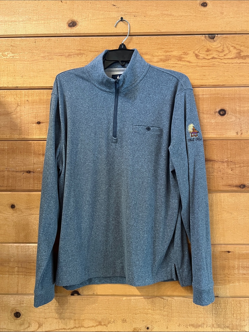johnnie-O Castro quarter-zip performance pullover with a Bali Hai logo